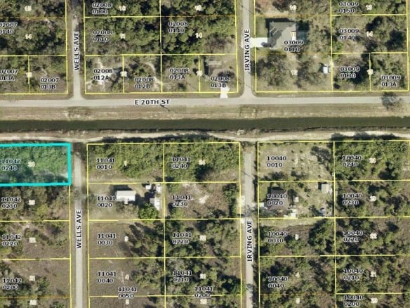 1923 Wells Avenue, Lehigh Acres FL 33972 — #R11004333