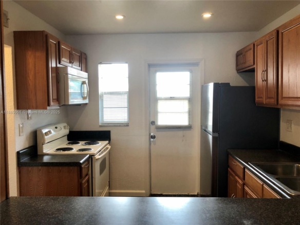 8121 SW 24th Ct # 304, Davie FL 33324 — #A11885066