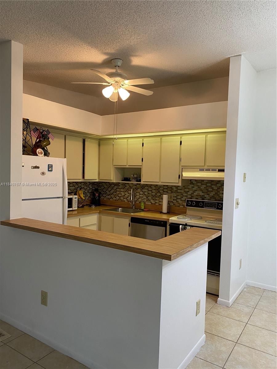 83dcefb7-1480 10407 E Clairmont Cir # 210, Tamarac FL 33321 — #A11840767