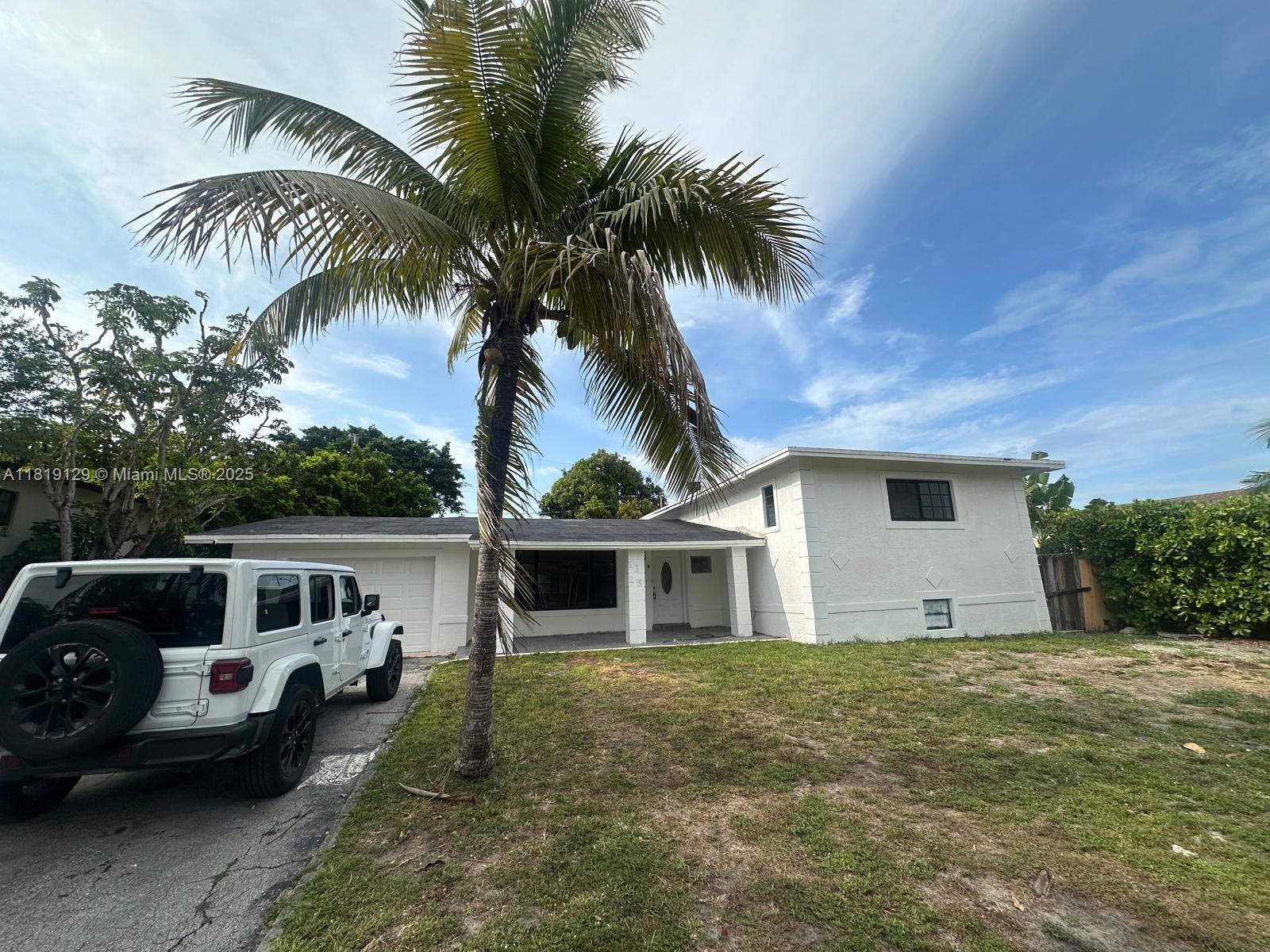 1325 NE 203rd St, Miami FL 33179 — #A11819129