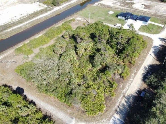7502 JOAN AVE N, Lehigh Acres FL 33971 — #A11933723