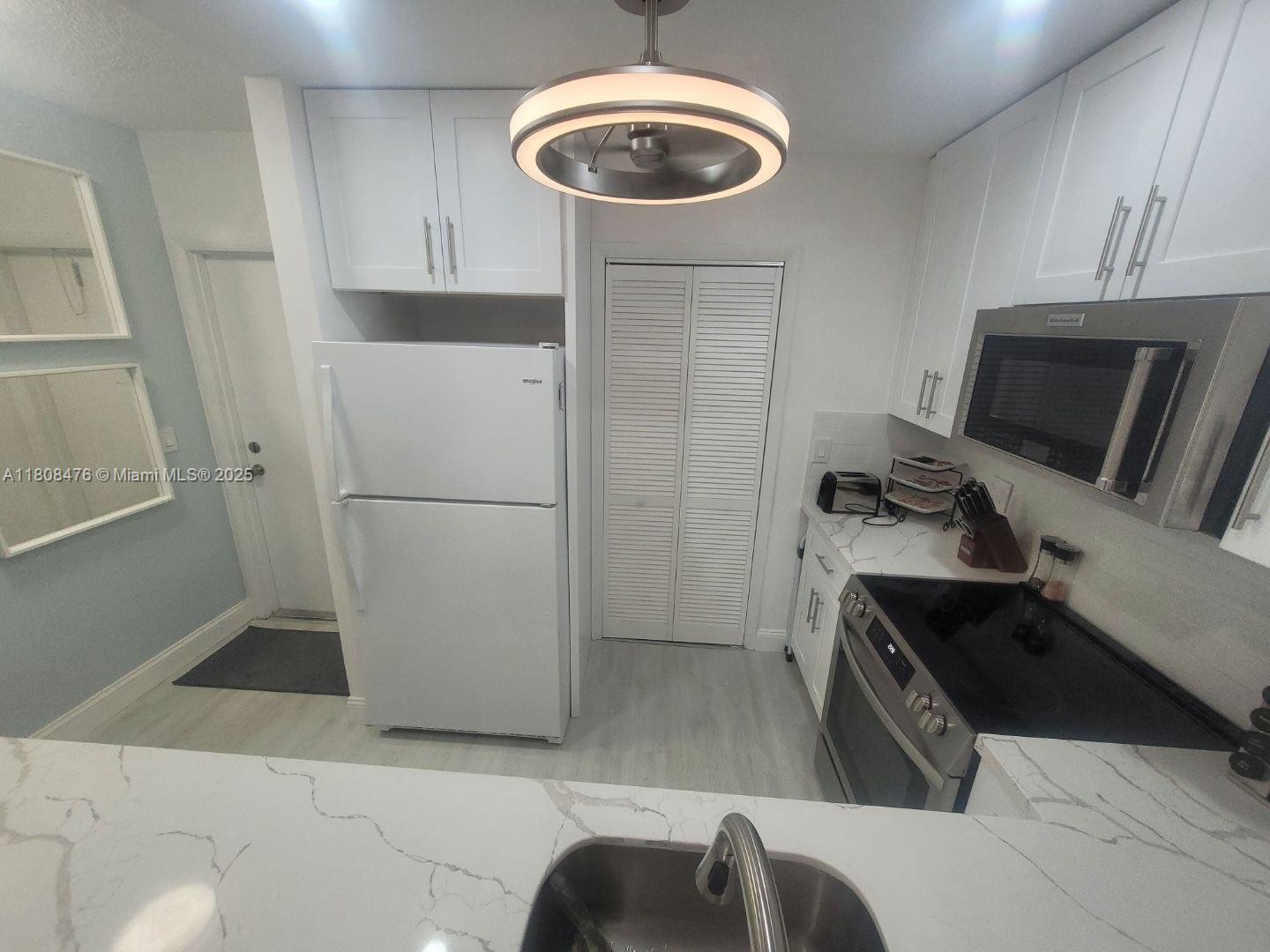300 Golden Isles Dr # 217, Hallandale Beach FL 33009 — #A11808476