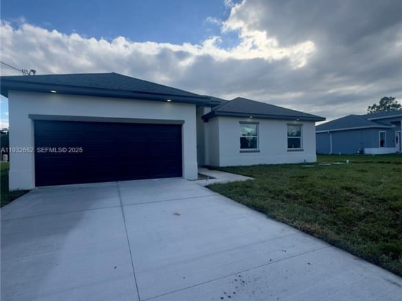 748 748 CHESTNUT ST E, Lehigh Acres FL 33974 — #A11932662