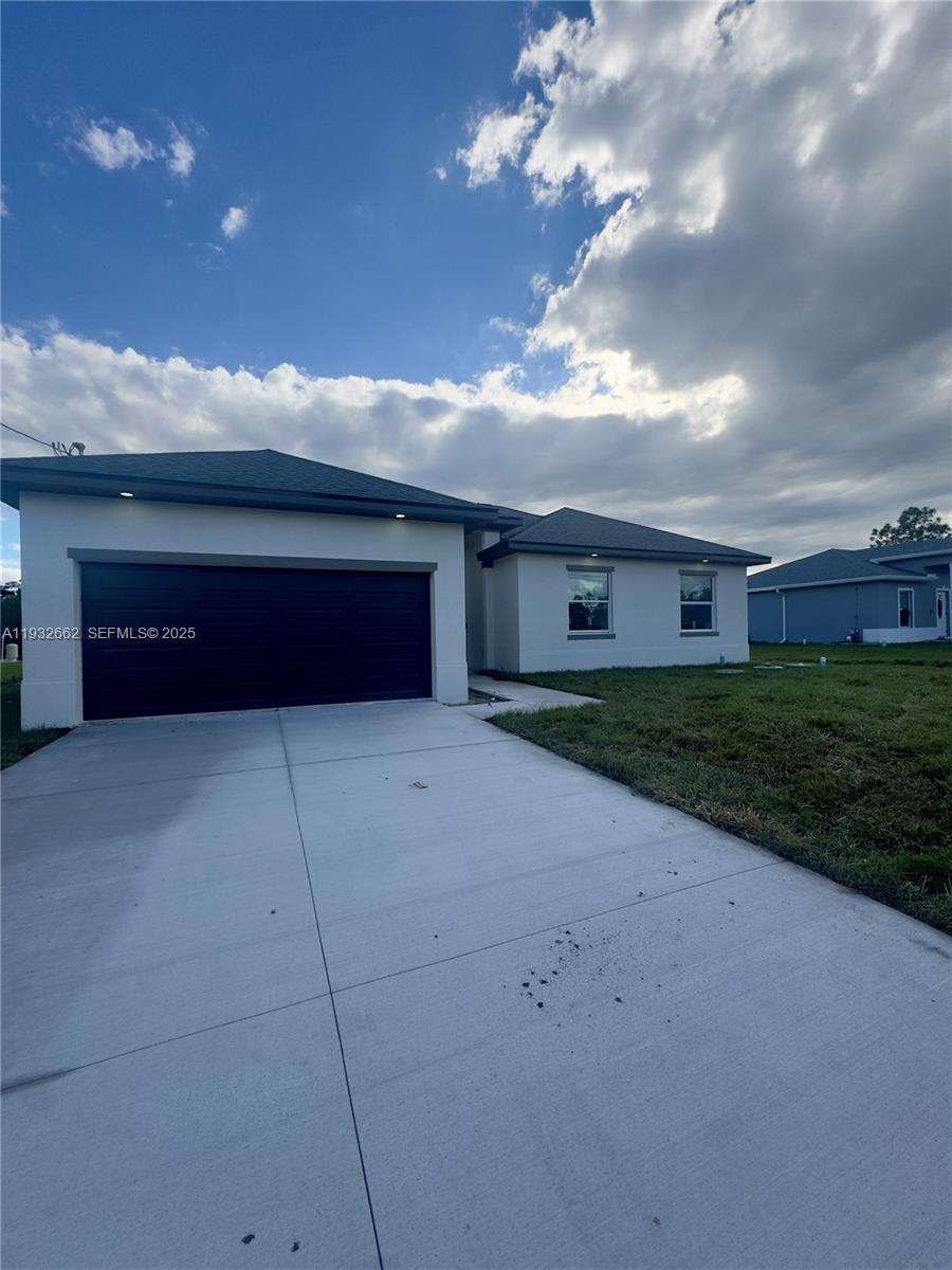 748 748 CHESTNUT ST E, Lehigh Acres FL 33974 — #A11932662