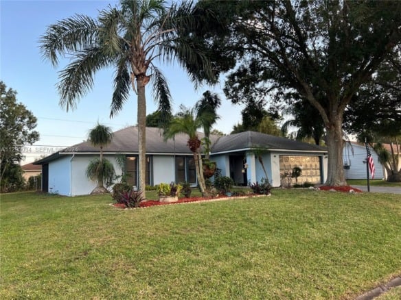 1921 SW Hickock Ter, Port St. Lucie FL 34953 — #A11295034