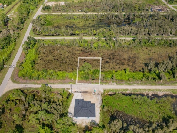 853 Belden Ave, Lehigh Acres FL 33936 — #A11494363