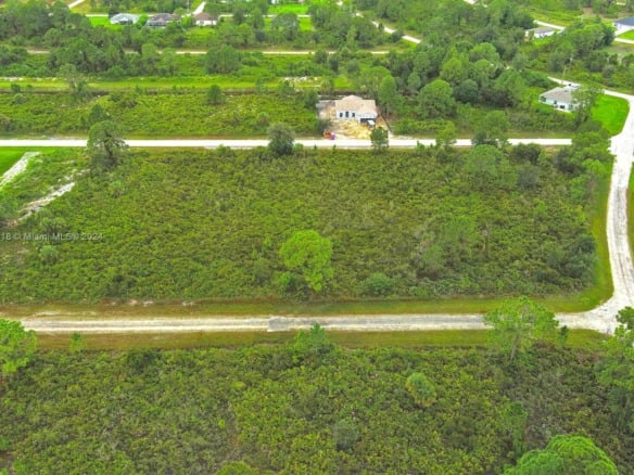 642 Vasser Ave S, Lehigh Acres FL 33974 — #A11659918