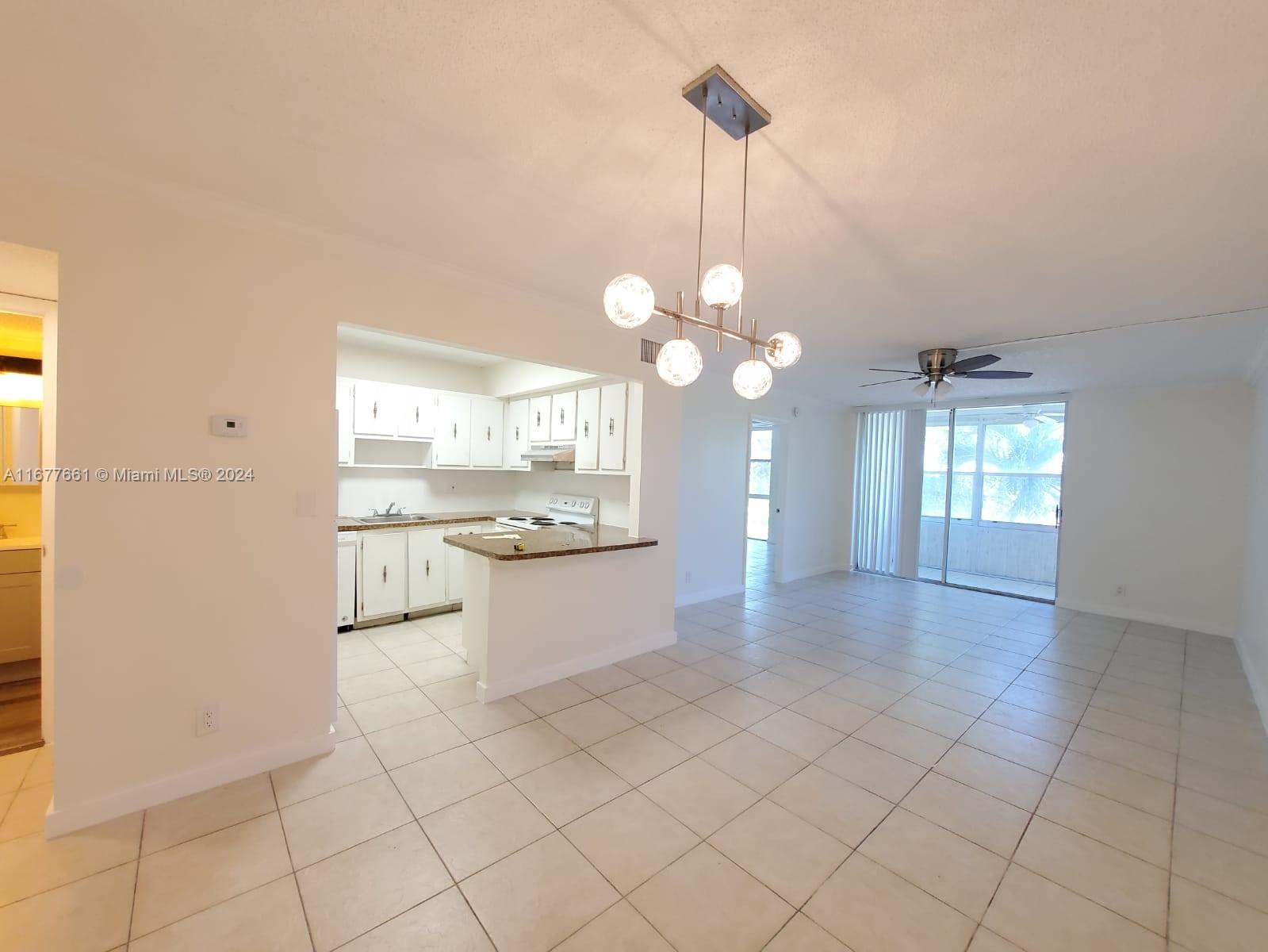 2029 NW 46th Ave # E308, Lauderhill FL 33313 — #A11677661