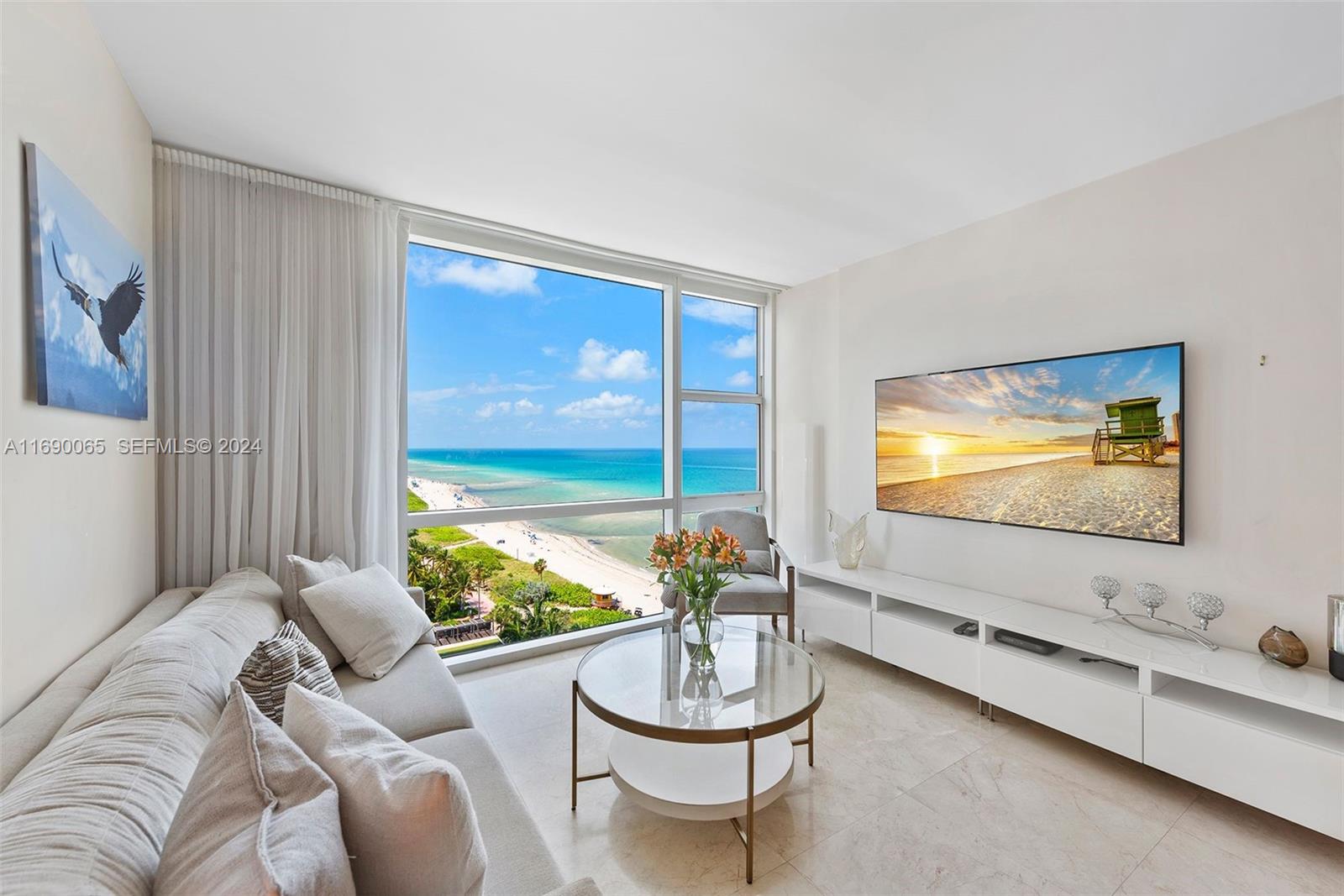 83dcefb7-4054 6801 Collins Ave # 1215, Miami Beach FL 33141 — #A11690065