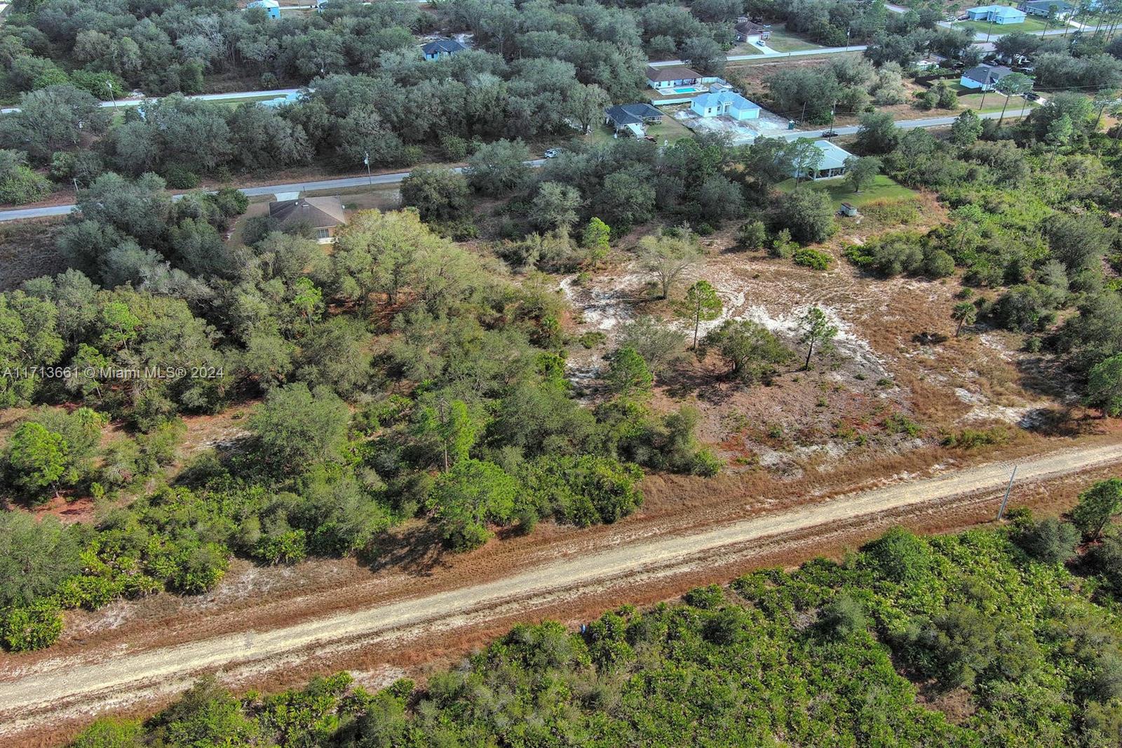 1514 Poinsettia Ave, Lehigh Acres FL 33972 — #A11713661