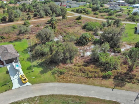 309 Raber Ave, Lehigh Acres FL 33974 — #A11713666