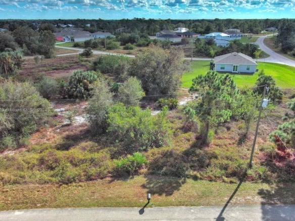 311 Raber Ave, Lehigh Acres FL 33974 — #A11713670