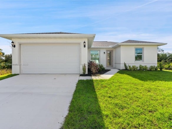 957 COMMODORE ST, Lehigh Acres FL 33974 — #A11715235
