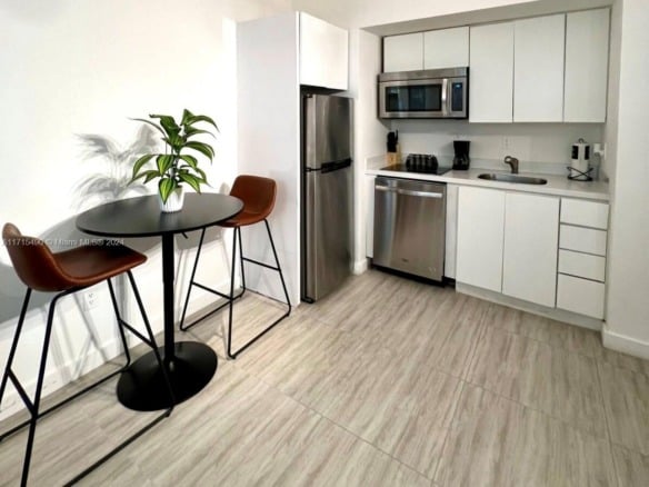 1611 Meridian Ave # 102, Miami Beach FL 33139 — #A11715490