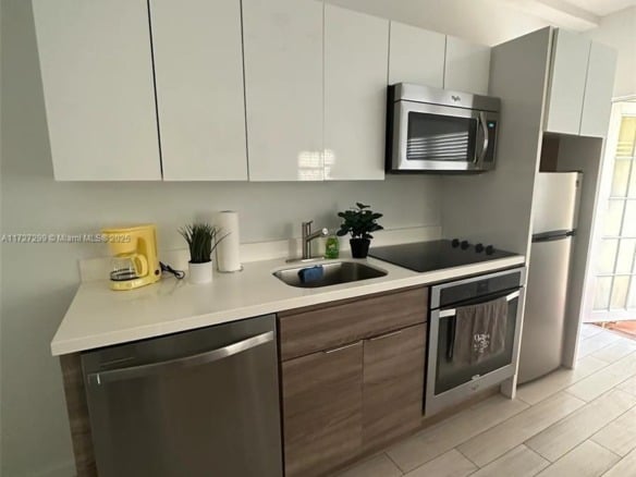 1450 Meridian Ave # 107, Miami Beach FL 33139 — #A11727299