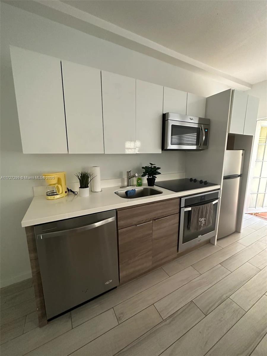 1450 Meridian Ave # 107, Miami Beach FL 33139 — #A11727299