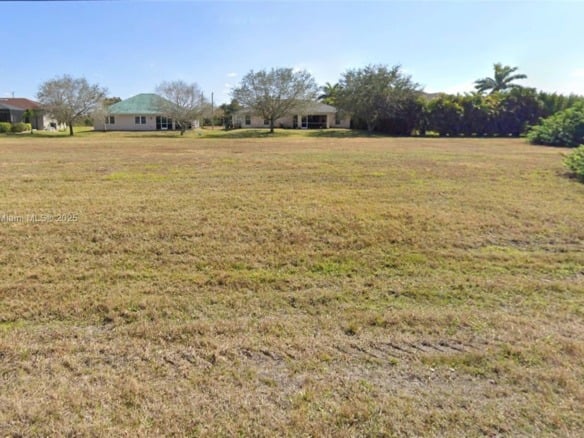 207 NW 27th Ave, Cape Coral FL 33993 — #A11738415