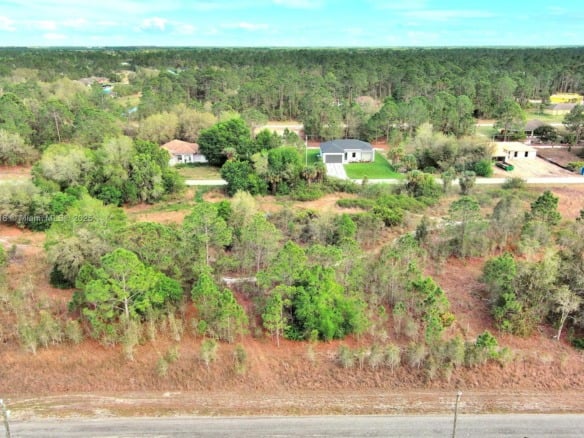 565 Summit Ave S, Lehigh Acres FL 33974 — #A11755718