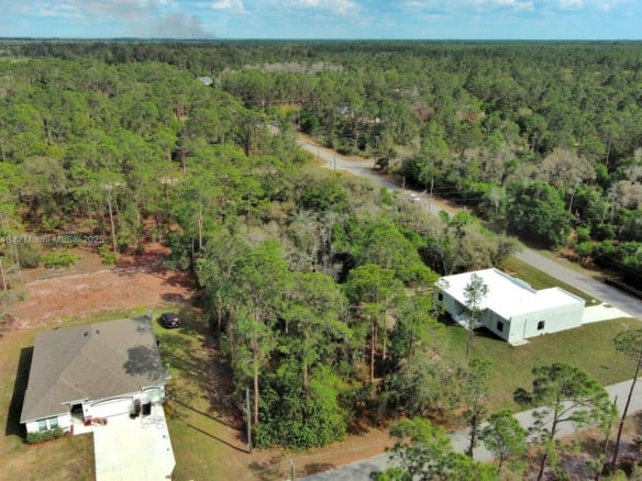 1702 Greenwood Ave, Lehigh Acres FL 33972 — #A11755748