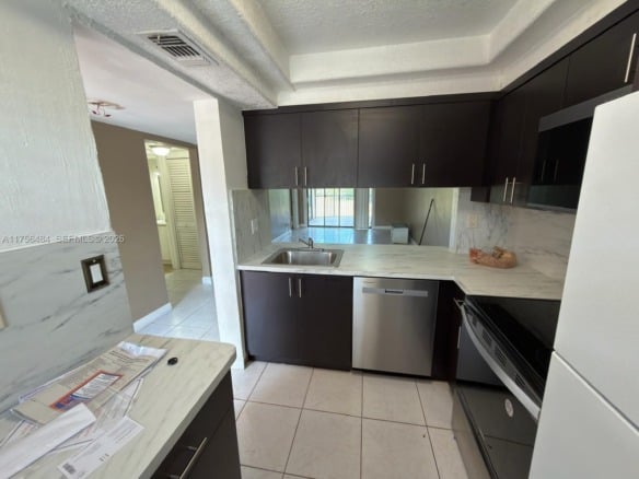 3400 Foxcroft Rd # 212, Miramar FL 33025 — #A11756484