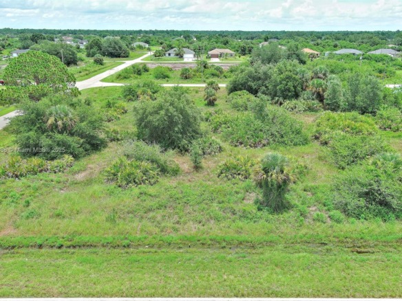 841 Milwaukee Blvd, Lehigh Acres FL 33974 — #A11842386