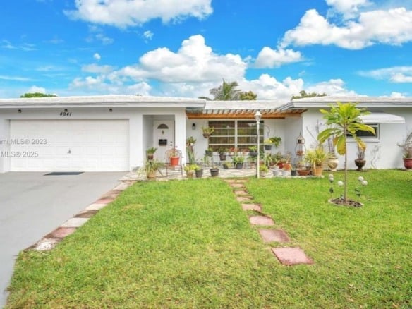 4941 NW 55th Ct, Tamarac FL 33319 — #A11787344