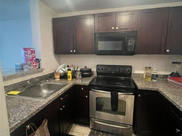 482 NW 165th St Rd # A203, Miami FL 33169 — #A11790957