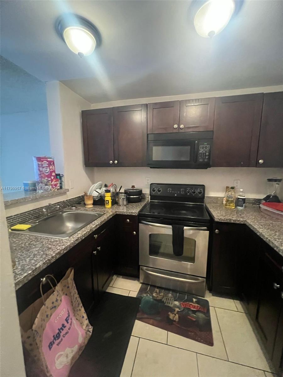 83dcefb7-5492 482 NW 165th St Rd # A203, Miami FL 33169 — #A11790957