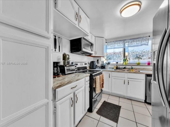 2451 NW 41st Ave # 304, Lauderhill FL 33313 — #A11799767
