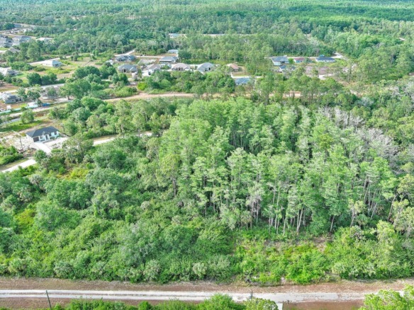 520 Woodman Dr, Lehigh Acres FL 33972 — #A11799815