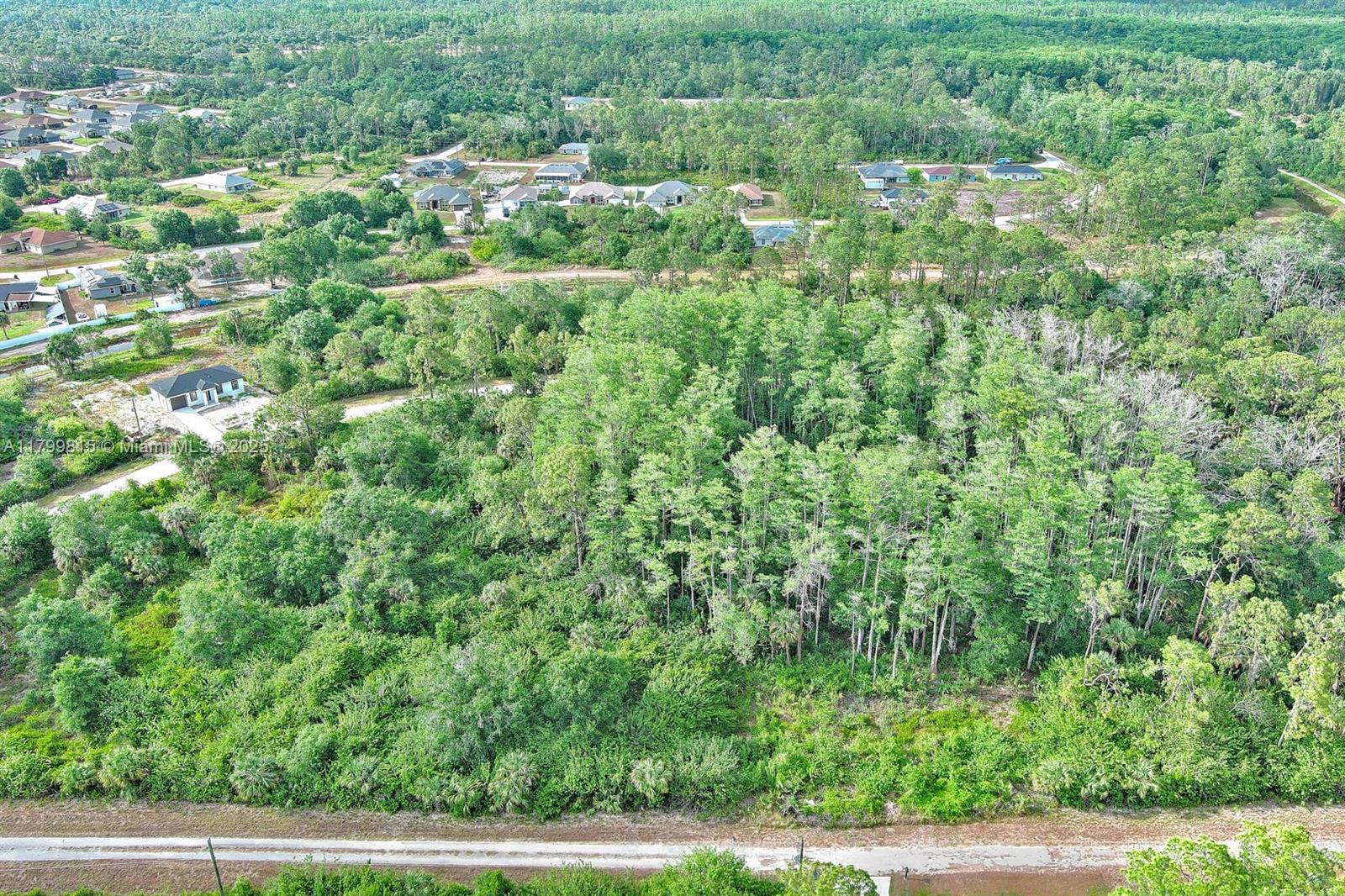 520 Woodman Dr, Lehigh Acres FL 33972 — #A11799815