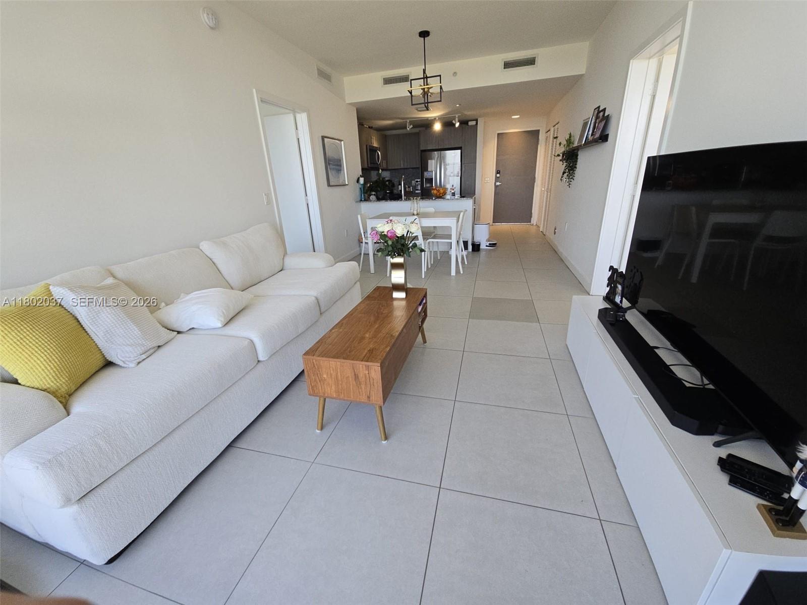 83dcefb7-5717 5350 NW 84th Ave # 1207, Doral FL 33166 — #A11802037