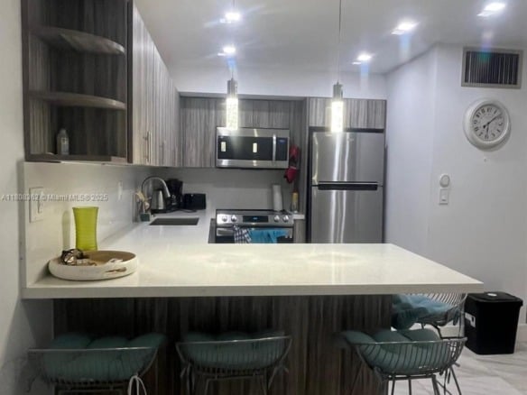 2145 Pierce St # 422, Hollywood FL 33020 — #A11808362