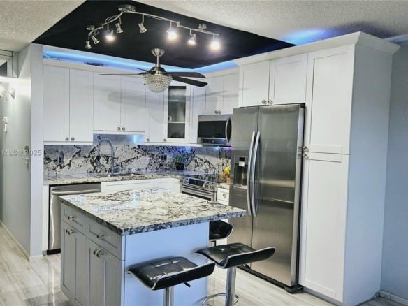 1401 SW 134th Way # 412C, Pembroke Pines FL 33027 — #A11816595