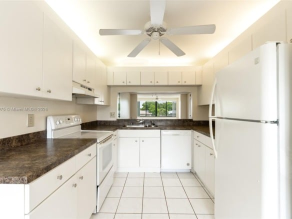 9455 N Belfort Cir # 211, Tamarac FL 33321 — #A11823075