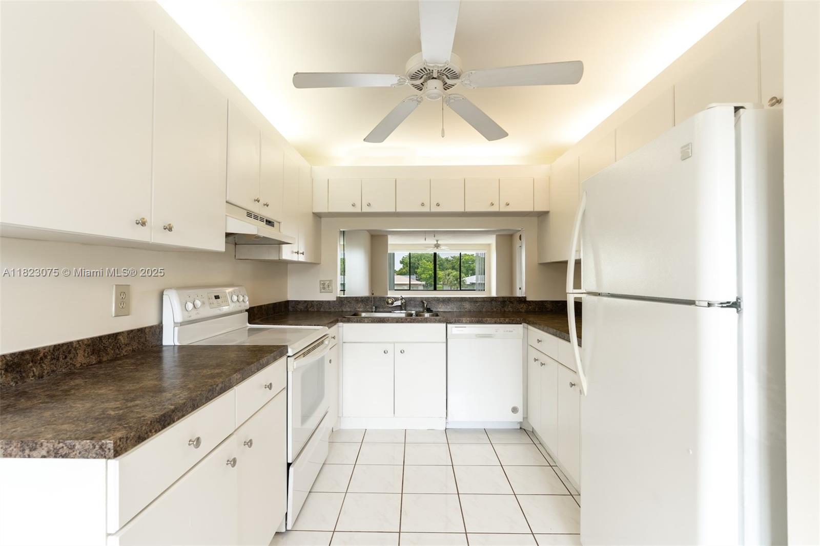 83dcefb7-6221 9455 N Belfort Cir # 211, Tamarac FL 33321 — #A11823075