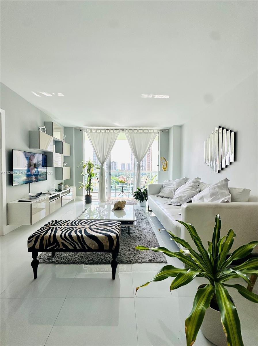 19390 Collins Ave # 911, Sunny Isles Beach FL 33160 — #A11826476
