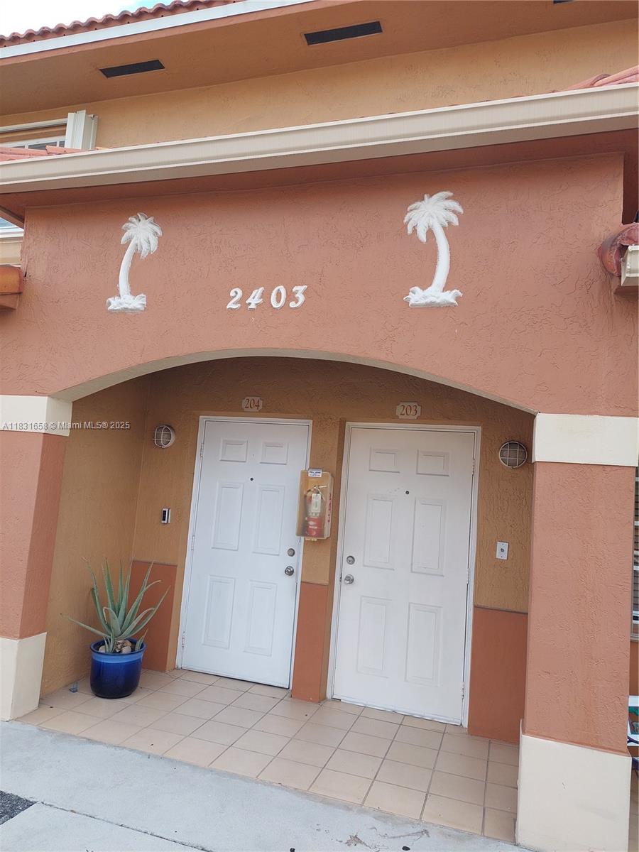 2403 W 76th St # 203, Hialeah FL 33016 — #A11831658
