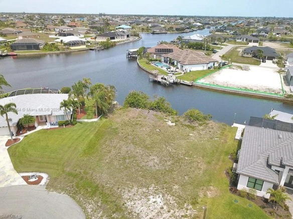 1253 NW 39th Ave, Cape Coral FL 33993 — #A11832064