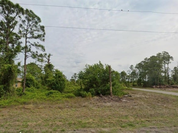 1127 Eclipse St, Lehigh Acres FL 33974 — #A11837222