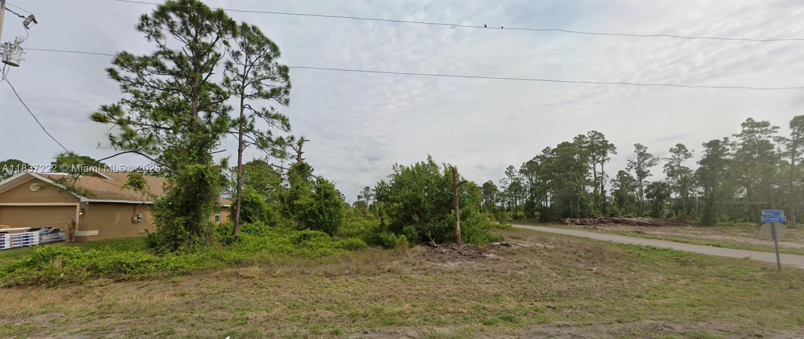 1127 Eclipse St, Lehigh Acres FL 33974 — #A11837222