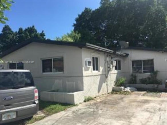 1574 NW 58th St, Miami FL 33142 — #A11849198