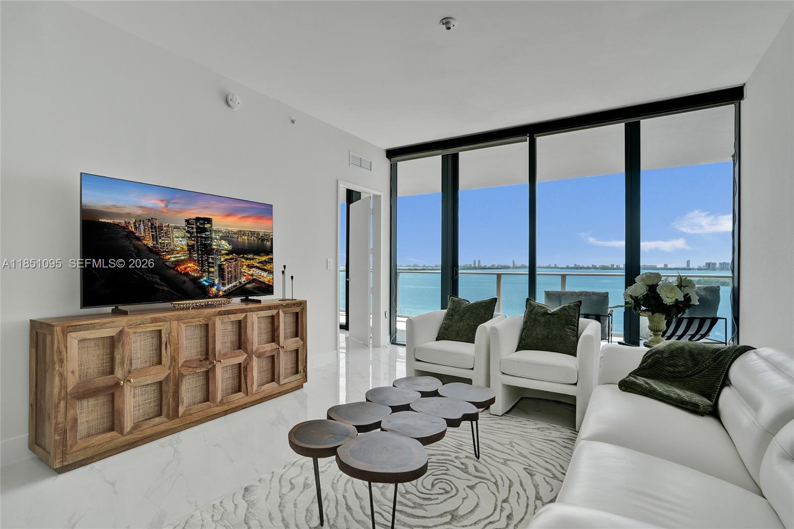 83dcefb7-7125 700 NE 24th St # 806, Miami FL 33137 — #A11851095