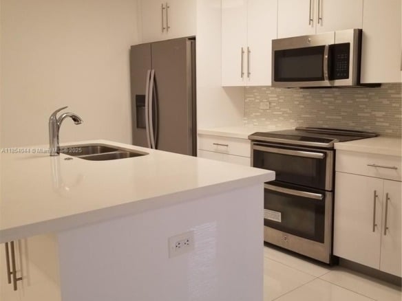 2651 NE 212th Ter # 103, Miami FL 33180 — #A11854044