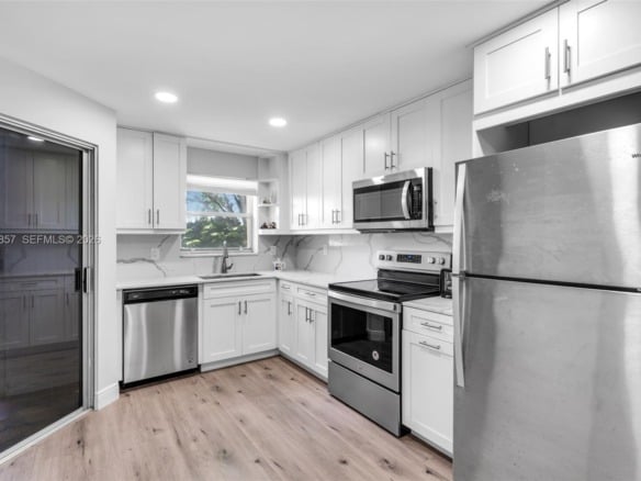 3524 Via Poinciana # 302, Lake Worth FL 33467 — #A11854857