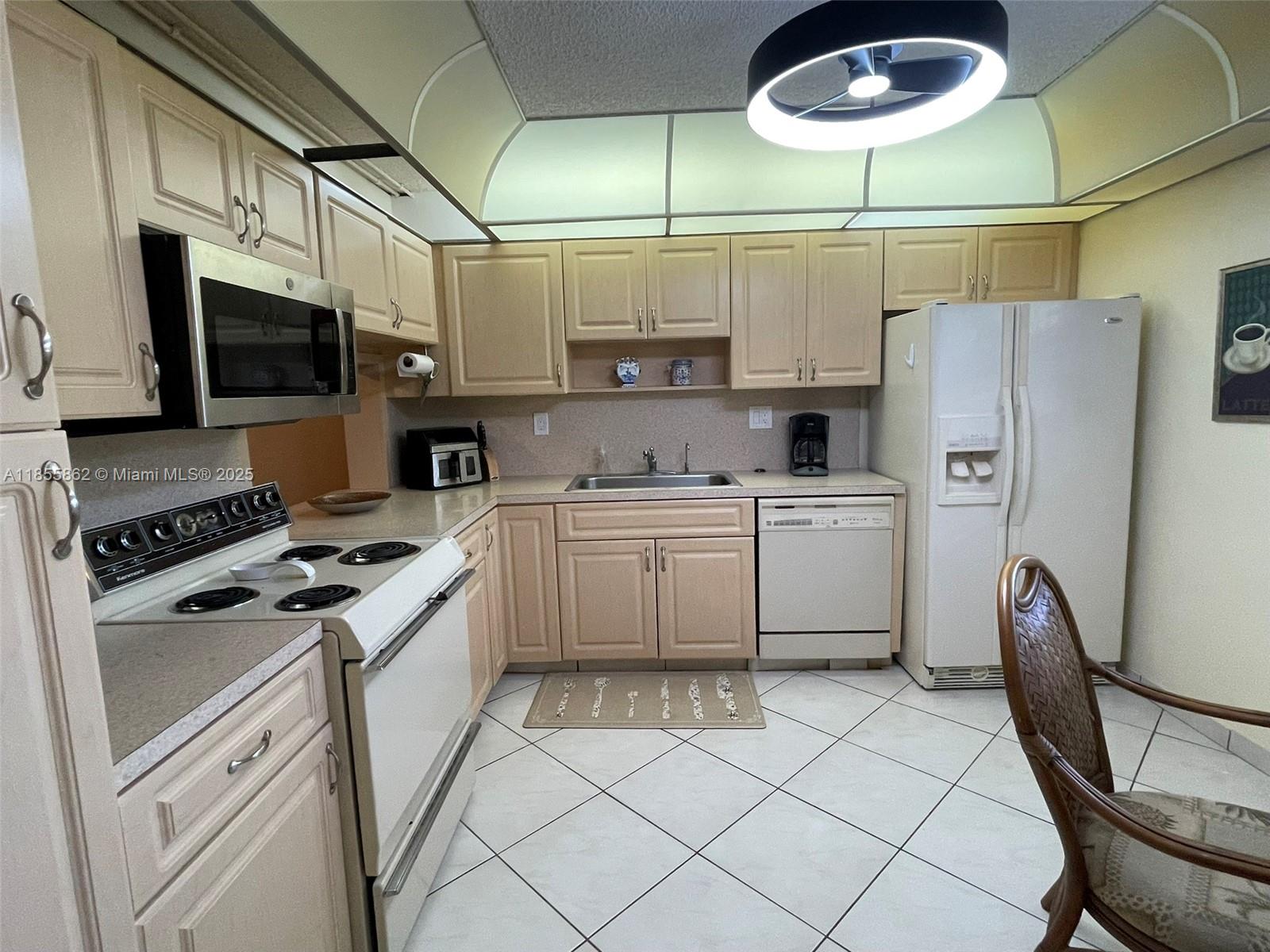 83dcefb7-7330 4975 E Sabal Palm Blvd # 208, Tamarac FL 33319 — #A11855862