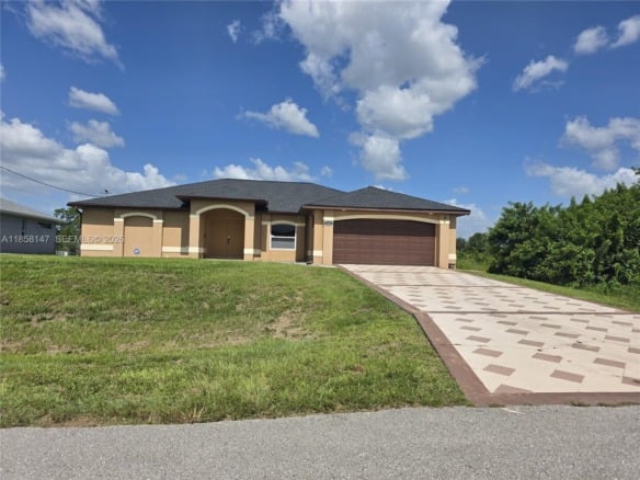 1816 Tomaso Ave, Lehigh Acres FL 33972 — #A11858147