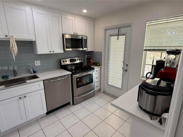 2671 S Course Dr # 403, Pompano Beach FL 33069 — #A11859507