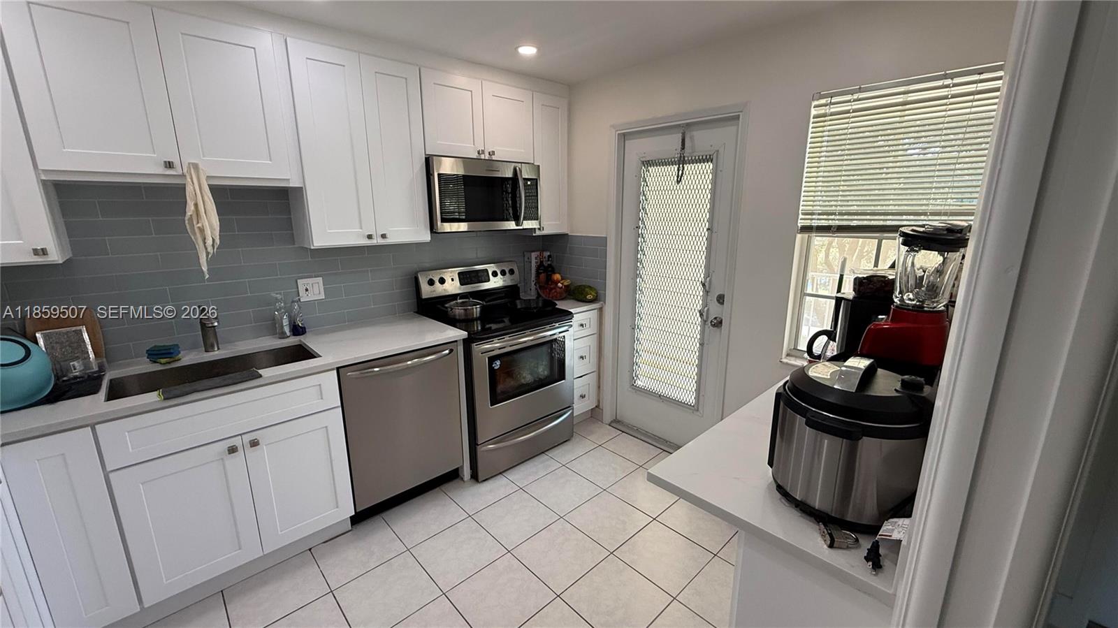 2671 S Course Dr # 403, Pompano Beach FL 33069 — #A11859507