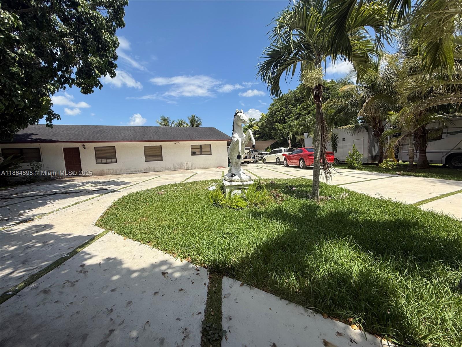 83dcefb7-7725 15765 SW 206th Ave, Miami FL 33187 — #A11864698